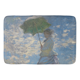 Frau mit Sonnenschirm - Frau Monet und ihr Sohn Badematte