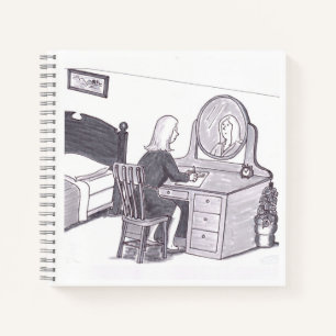 Frau sitzt an einem Schreibtisch im Schlafzimmer m Notizbuch