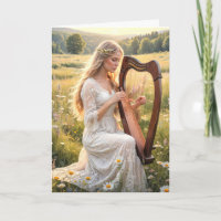 Frauen spielen Harfe in Wildblumen