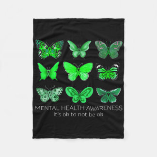 Frauen tragen im Mai einen grünen Schmetterling fü Fleecedecke