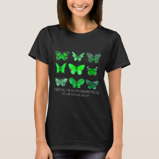 Frauen tragen im Mai einen grünen Schmetterling fü T-Shirt