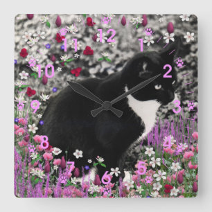 Freckles in den Blumen II - Tuxedokitty-Katze Quadratische Wanduhr