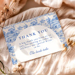 French Blue Toile Garden Bridal Shower Dankeskarte<br><div class="desc">This elegant design features a classic blue toile-inspired floral pattern arranged in decorative vertical panels that frame a graceful arched layout. Delicate botanical illustrations and vintage textile motifs create a refined grandmillennial aesthetic reminiscent of antique porcelain and traditional French garden fabrics. The timeless blue and ivory palette gives the design...</div>