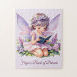Freya's Book of Dreams Fairy Puzzle<br><div class="desc">Dieses magische Puzzle besticht durch eine sanfte pastellfarbene Fee mit lila Flügeln,  die ein Buch lesen,  umgeben von traumhaften Sternen und Weinbergen. Mit "Freyas Buch der Träume" auf dem Cover ist es eine wunderschöne Aktivität für Kinder,  Leser und Fantasy-Liebhaber. Ein schönes Geschenk,  um Fantasie und Erzählspass zu entfachen.</div>