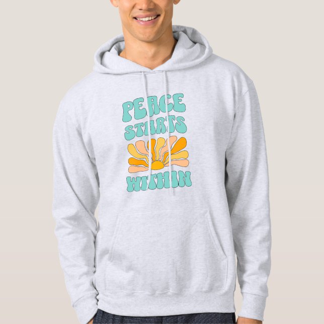 Frieden beginnt in hoodie (Vorderseite)