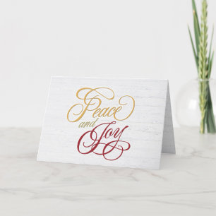 Frieden und Freude auf weißem Holz Feiertagskarte