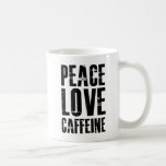 FRIEDENSLIEBE CAFFEINE TASSE<br><div class="desc">Peace Liebe Koffein. Für den Kaffeeliebhaber. Grunge-Stil schwarze Buchstaben auf hübsche weiße Keramik Tasse. Design von Marisu Valencia,  Copyright 2012.</div>
