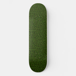 Frisches grünes Grasskateboard Skateboard