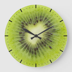 Frisches Kiwi. Runde Scheibe abgeschieden Große Wanduhr