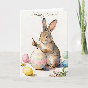 Frohe Ostern Vintage-Hase malt ein Ei Karte