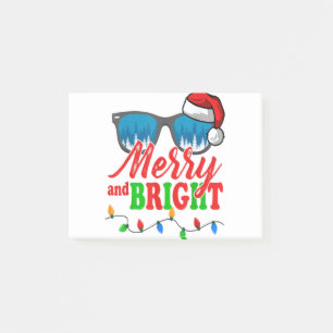 Frohe und helle Weihnachtsbrille Weihnachtsmannmüt Post-it Klebezettel