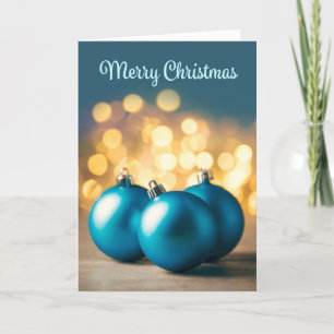 Frohe Weihnachten für jeden drei blaue Ornamente