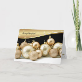 Frohe Weihnachten. Gold Baubles Feiertagskarte