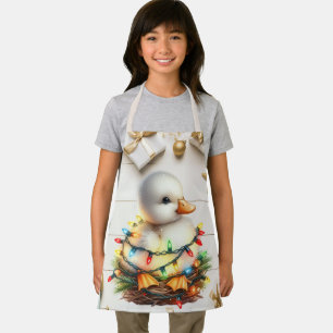 Frohe Weihnachten kleine Duckling in den Lichtern  Schürze