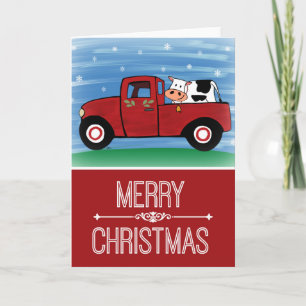 Frohe Weihnachten Kuh in einer roten Lastwagen-Gru