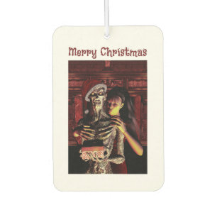 Frohe Weihnachten. Lustiges Skelett mit Frau Autolufterfrischer