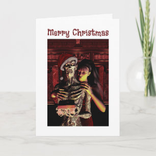 Frohe Weihnachten. Lustiges Skelett mit Frau Karte