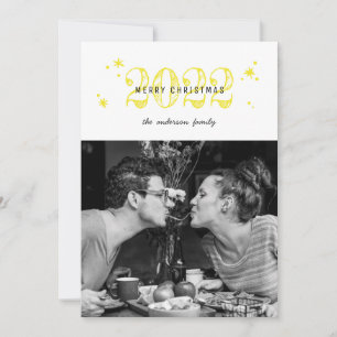 Frohe Weihnachten. Niedliches modernes Gelbschnee- Feiertagskarte