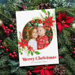 Frohe Weihnachten Poinsettia Festliches Familienfe<br><div class="desc">Eine wunderschöne rote Poinsettienblüte mit heiligen Blättern umkreist Ihr festliches Foto über frohen Weihnachten. Helle und fröhliche Kinder fotografieren Urlaubskarten mit hübschen Blume und Blätter,  die den oberen und unteren Rand auf der Rückseite bilden.</div>