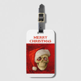 Frohe Weihnachten. Totenkopf mit Santa Hut Gepäckanhänger