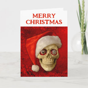 Frohe Weihnachten. Totenkopf mit Santa Hut Karte