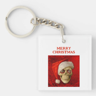 Frohe Weihnachten. Totenkopf mit Santa Hut Schlüsselanhänger