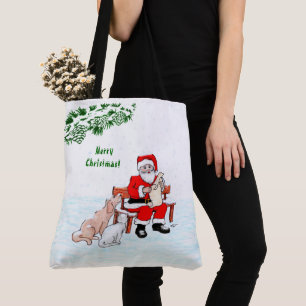 Frohe Weihnachten! Weihnachtsmann mit Katze und Hu