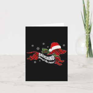 Frohe Weihnachts-Dackel Hund durch den Schneepla Karte