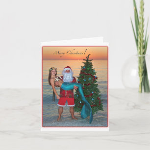 Frohe Weihnachts-Meerjungfrau mit Santa am Strand Feiertagskarte