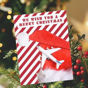 Frohe Weihnachts Rote Weihnachtsmannmütze & Flugze Feiertagspostkarte