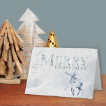 Frohe Weihnachts-Wasserfarben-Stag und HirschElega Feiertagskarte<br><div class="desc">Personalisierte Weihnachtskarten mit eleganter Kalligraphie und schlichter Eleganz. Dieses Aquarell-Design hat eine Schneeszene mit Waldsteg und Hirsch. Frohe Weihnachten wird mit verzierter Aquarelltypografie mit Wintergrün geschmückt. Im Inneren ist die Vorlage Set für Sie,  um Ihre Nachricht hinzuzufügen. Auf der Rückseite ist ein passendes Design.</div>