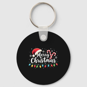 Frohe Weihnachtsbeleuchtung Red Weihnachtsmannmütz Schlüsselanhänger