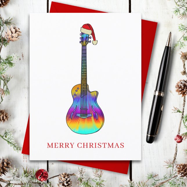 Frohe Weihnachtsgitarre farbenfroh Feiertagspostkarte (Christmas guitar wearing a santa hat holiday greetings postcard )