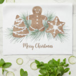Frohe Weihnachtskekse Geschirrtuch<br><div class="desc">Dieses festliche Küchentuch ist mit Weihnachtskeksen in Aquarellen und Blättern dekoriert und sagt Frohe Weihnachten. Einfach anpassbar. Weil wir unsere Kunstwerke erstellen, werden Sie dieses exakte Bild von anderen Designern nicht finden. Original Wasserfarbe © Michele Davies.</div>