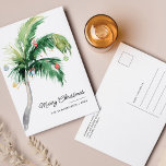 Frohe Weihnachtspalme Bäume Küste Feiertagspostkarte<br><div class="desc">Eine moderne,  stilvolle,  flache Gästekarte mit moderner und handgeschriebener Schrift-Typografie mit einem geschmückten Palmenbaum. Passen Sie diese Karte einfach an,  indem Sie auf die Schaltfläche "Personalisieren" klicken.</div>