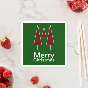 Frohe Weihnachtstypografie Rote grüne Pinienbäume Serviette