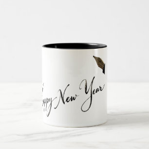 Frohes neues Jahr handgeschriebene Tinte Zweifarbige Tasse