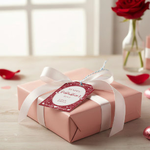 Frohes Valentinstags-Geschenkkarte mit Herzen und Geschenkanhänger