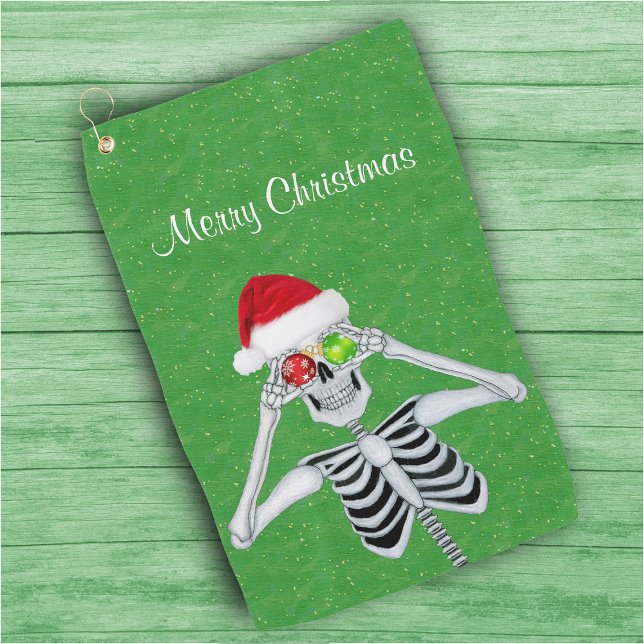 Frohes Weihnachten Skeleton Ornament Eyes Green Go Golfhandtuch (Happy skeleton red Santa hat snowflake ornaments on green Christmas golf towel.)