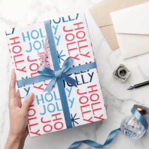 Fröhliche Holly-Typografie Rot Blau Weiß Weihnacht Geschenkpapier