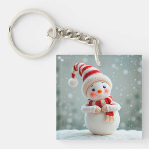 Fröhliche Schneemann-Figur mit festlichem Hut Schlüsselanhänger