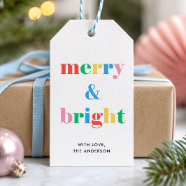 Fröhliche und helle bunte Typografie Weihnachten Geschenkanhänger