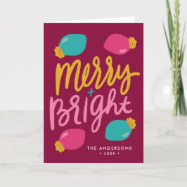 Fröhliche und helle Weihnachtsleuchten außerhalb d Feiertagskarte