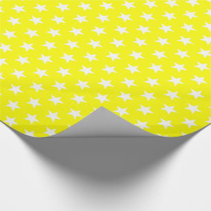 Fröhliche und helle weiße Sterne auf gelbem Urla Geschenkpapier