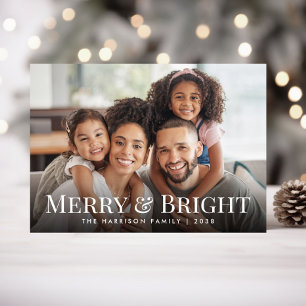 Fröhliche und strahlende Familienfoto-Weihnachten Feiertagskarte