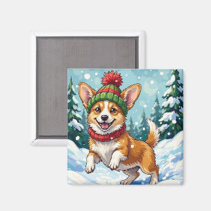 Fröhlicher Corgi-Hund springt im Schnee mit Pom-Po Magnet