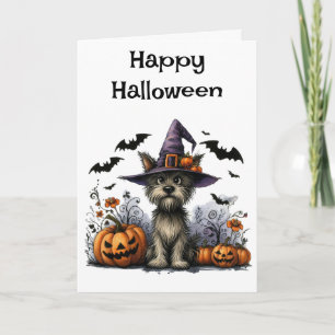 Fröhlicher Halloween-Hund in einem Hexenhut Karte