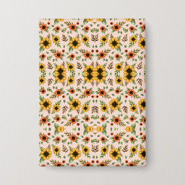 Front and back views of a floral-patterned  button