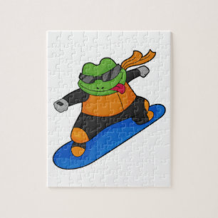 Frosch als Snowobarder mit Snowboard Puzzle