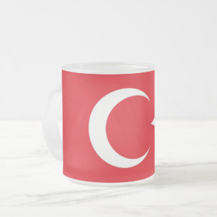 Frostierter kleiner Glaskrug mit der Flagge der Tü Mattglastasse